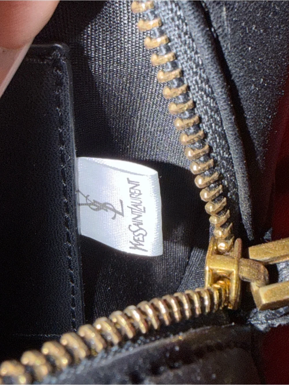 Yves Saint Laurent Black Quilted Leather Crossbody with Gold Logo and Tassel